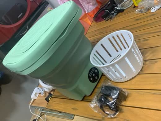 Recensione cliente di Davide con foto della mini lavatrice portatile